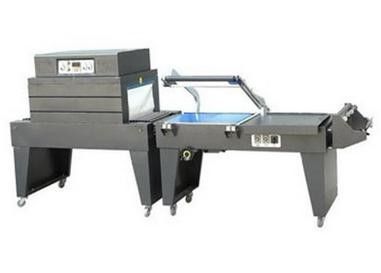 Macchina automatica 2KW L tipo impacchettatrice dell'involucro degli strizzacervelli del tunnel di calore dei semi dell'involucro degli strizzacervelli